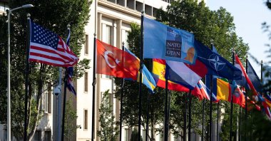 The NATO flag, together with the flags of the NATO members, is seen outside the VIP entrance at the World Forum during the NATO Summit, in The Hague, the Netherlands, June 25, 2025. (Getty Images File Photo)