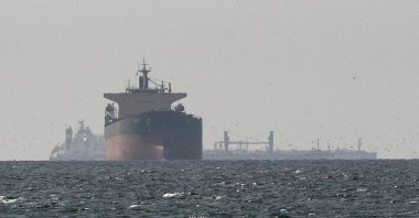 Cargo ships in the Gulf, near the Strait of Hormuz, as seen from northern Ras al-Khaimah, near the border with Oman’s Musandam governance, amid the U.S.-Israeli conflict with Iran, in the United Arab Emirates, March 11, 2026. (Reuters File Photo)