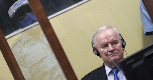 Ex-Bosnian Serb military chief Ratko Mladic sits in the defendant box during the hearing of the final verdict on appeal against his genocide conviction over the 1995 Srebrenica massacre, Europe's worst act of bloodshed since World War II, at the International Residual Mechanism for Criminal Tribunals (IRMCT) in The Hague, June 8, 2021. (AFP File Photo)