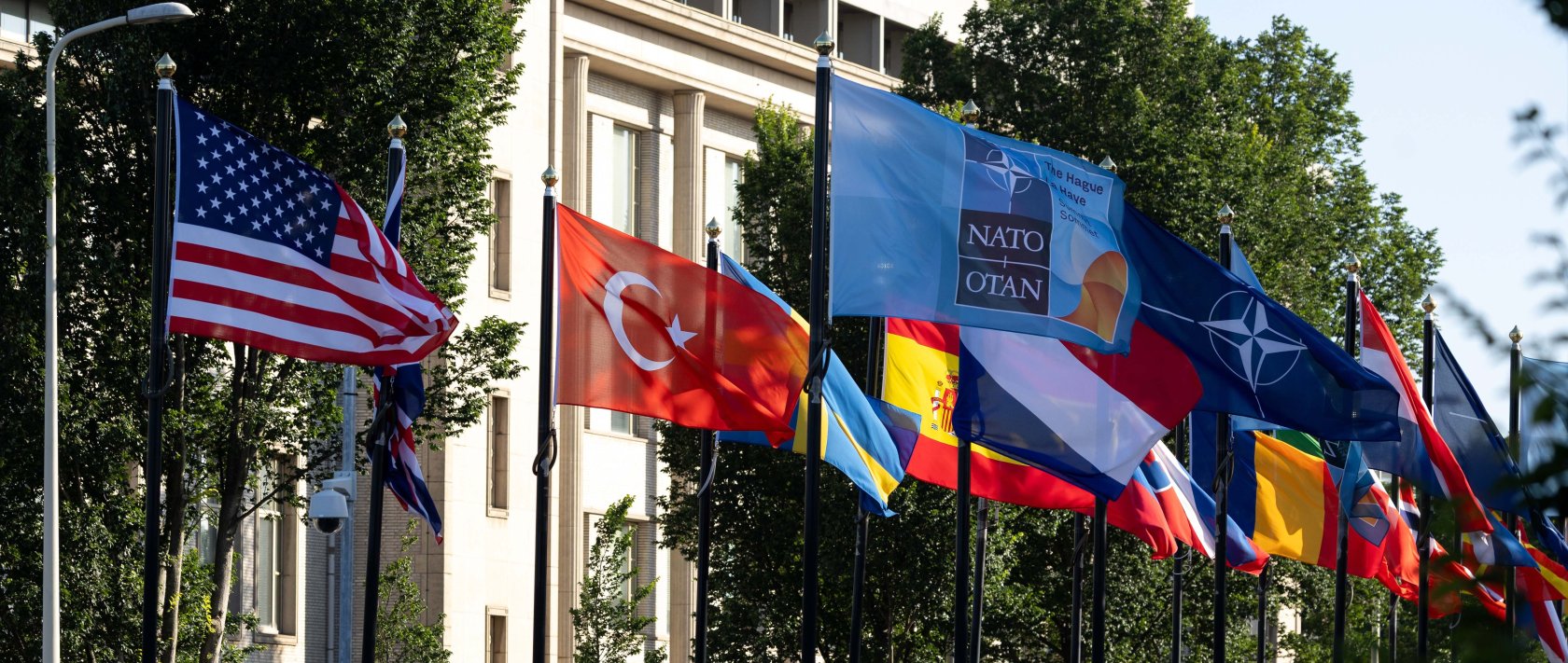 The NATO flag, together with the flags of the NATO members, is seen outside the VIP entrance at the World Forum during the NATO Summit, in The Hague, the Netherlands, June 25, 2025. (Getty Images File Photo)