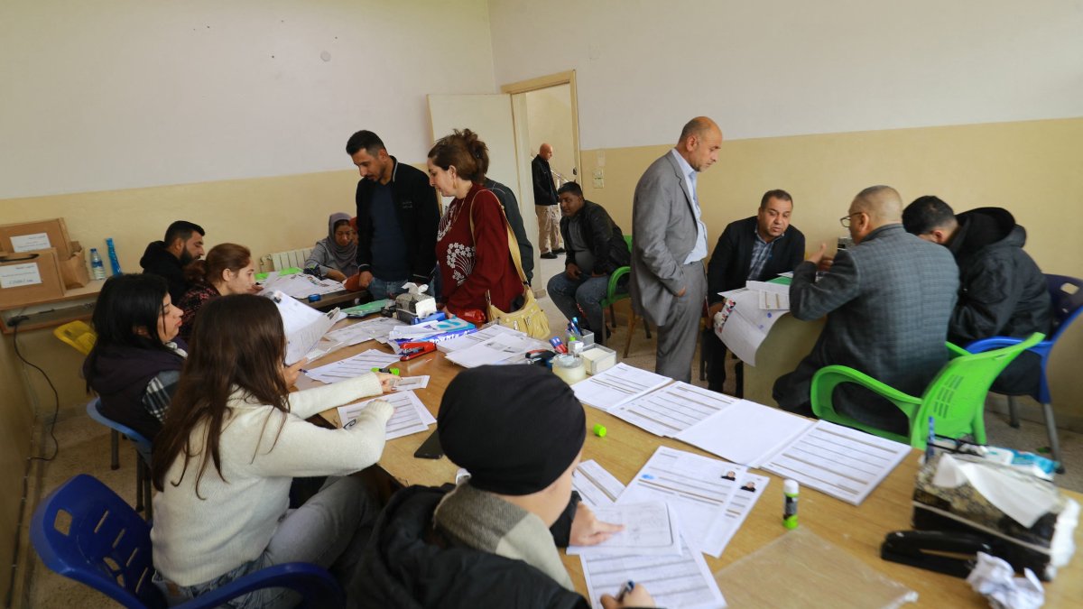 Forms are filled out as Syrian Kurds gather at a registration center for foreign Kurds and unregistered residents, al-Malikiyah, northeastern Syria, April 15, 2026. (AFP Photo)