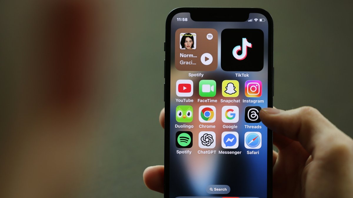 Social media apps are displayed on a phone, London, Britain, April 16, 2026. (EPA Photo)