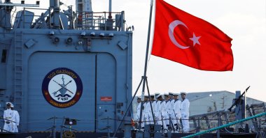 Turkish naval officers stand aboard the TCG Gaziantep (F-490), operated by the Turkish Naval Forces, before the ceremony to launch the drilling vessel Çağrı Bey, which is set to conduct Türkiye's first deep-sea drilling operation in the Indian Ocean near the Port of Mogadishu, Mogadishu, Somalia, April 10, 2026. (Reuters Photo)