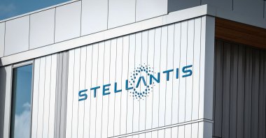 A photo shows a company logo at the Stellantis multinational car manufacturer's plant in Poissy, near Paris, France, April 15, 2026. (AFP Photo)