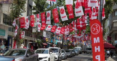 Flags of the MHP hang above a street, Istanbul, Türkiye, June 21, 2018. (Shutterstock Photo)
