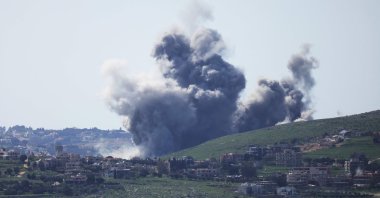 This photograph taken from the southern Lebanese area of Marjeyoun, shows smoke rising from the site of an Israeli strike that targeted the village of Kfar Tibnit, April 16, 2026. (AFP Photo)