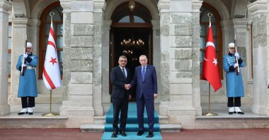 President Recep Tayyip Erdoğan and TRNC President Tufan Erhürman shake hands as they meet at Dolmabahçe Working Office, Istanbul, April 16, 2026. (AA Photo)