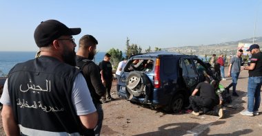People work at the site of an Israeli airstrike that targeted a vehicle in Jiyeh town, south of Beirut, Lebanon, April 16, 2026. (EPA Photo)