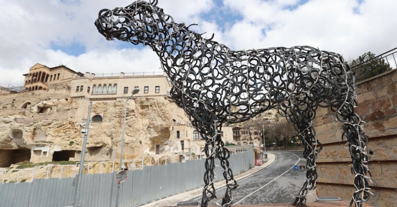 A horse sculpture made of metal horseshoes is displayed outside the Erhan Ayata Beautiful Horses Museum, Cappadocia, Nevşehir, Türkiye, April 10, 2026. (AA Photo)