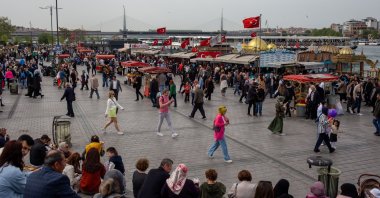 People walk through Eminönü, Istanbul, Türkiye, April 23, 2023. (Shutterstock Photo)