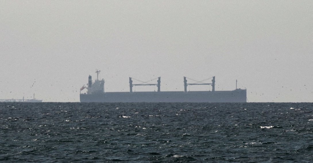 A cargo ship in the Gulf, near the Strait of Hormuz, as seen from northern Ras al-Khaimah, near the border with Oman’s Musandam governance, amid the U.S.-Israeli conflict with Iran, United Arab Emirates, March 11, 2026. (Reuters Photo)
