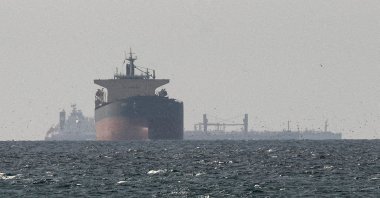 Cargo ships in the Gulf, near the Strait of Hormuz, as seen from northern Ras al-Khaimah, near the border with Oman’s Musandam governance, amid the U.S.-Israeli conflict with Iran, in United Arab Emirates, March 11, 2026. (Reuters Photo)