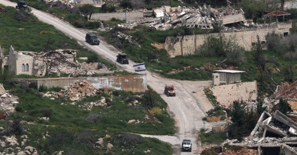 Israeli military vehicles maneuver on the Lebanese side of the border as seen from the Upper Galilee, on the Israel-Lebanon border, April 17, 2026. (EPA Photo)