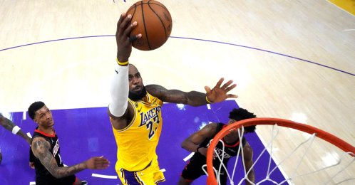 Lakers forward LeBron James (C) shoots the ball in an NBA game against Houston Rockets, Los Angeles, California, U.S., April 18, 2026. (Reuters Photo)