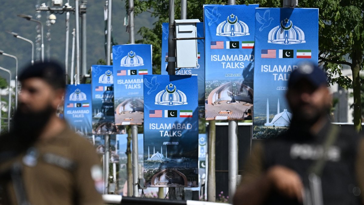 Security personnel stand guard at a security checkpost along a road temporarily closed in Islamabad, Pakistan, April 20, 2026. (AFP Photo)