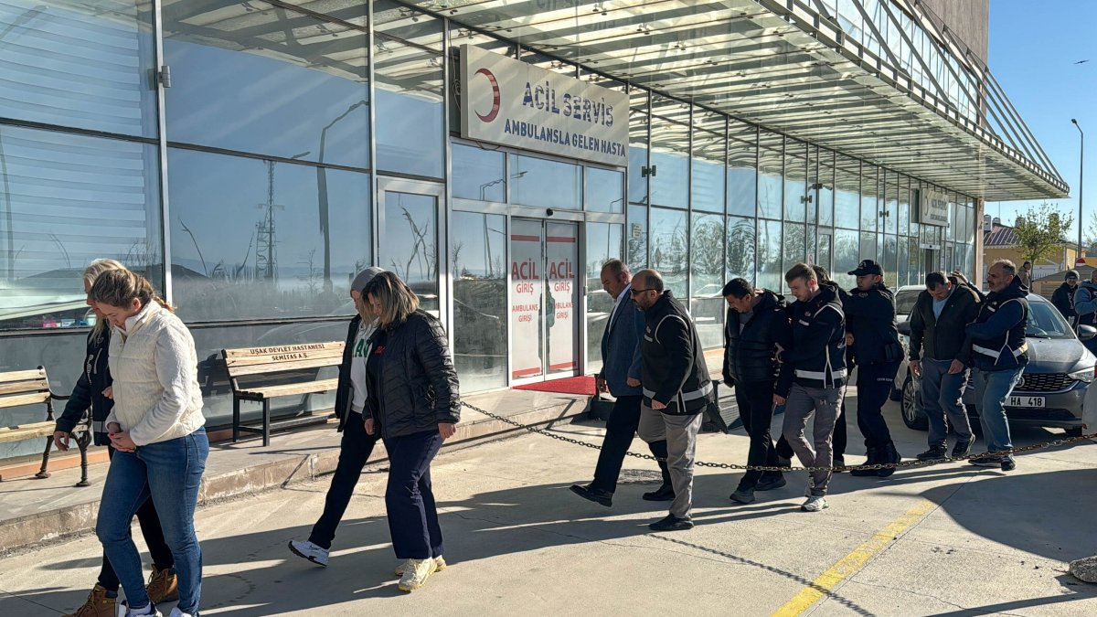Eşme Mayor and other suspects are escorted to the courthouse after being detained in an investigation into alleged misconduct in office linked to Eşme Municipality, Uşak, Türkiye, April 20, 2026. (AA Photo)