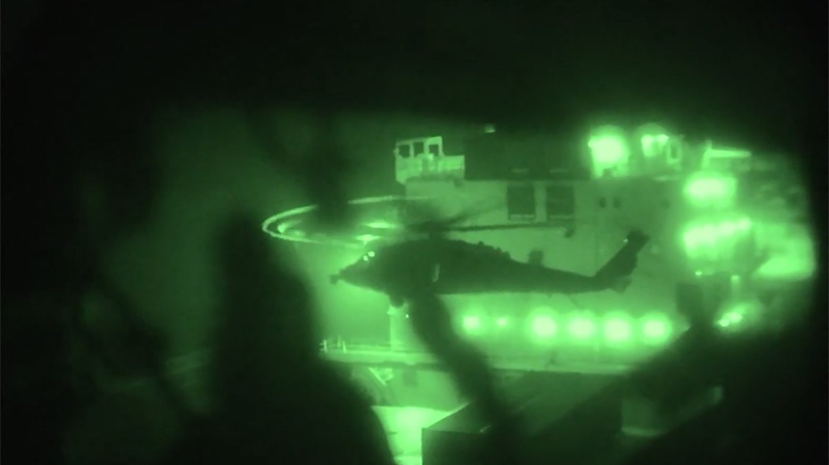 This screen grab shows U.S. Marines boarding and seizing the Iranian-flagged vessel M/V Touska in the Arabian Sea, April 19, 2026. (AFP Photo)