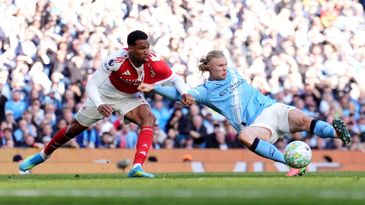 Manchester City's Erling Haaland scores his side's second goal during the a Premier League match against Arsenal, in Manchester, U.K., April 19, 2026. (AP Photo)