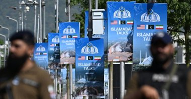 Security personnel stand guard at a security checkpost along a road temporarily closed in Islamabad, Pakistan, April 20, 2026. (AFP Photo)