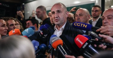 Rumen Radev (C), leader of the Progressive Bulgaria (PB) coalition, speaks to the media in Sofia, Bulgaria, April 19, 2026. (EPA Photo)