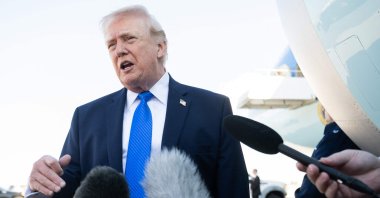 U.S. President Donald Trump speaks to reporters before boarding Air Force One at Palm Beach International Airport in West Palm Beach, Florida, March 23, 2026. (AFP Photo)