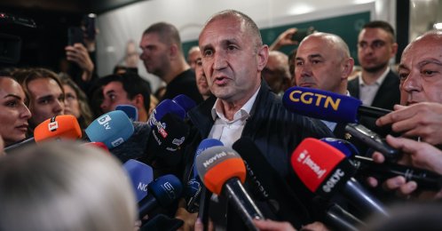 Rumen Radev (C), leader of the Progressive Bulgaria (PB) coalition, speaks to the media in Sofia, Bulgaria, April 19, 2026. (EPA Photo)