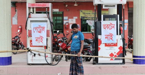 A man speaks on a phone near a closed fuel station, Manikganj, Bangladesh, April 8, 2026. (Reuters Photo)