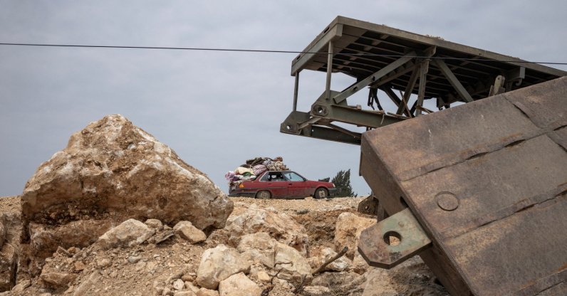 People travel in a vehicle as displaced people make their way back to their home in Qasmiyeh, southern Lebanon, April 19, 2026. (Reuters Photo)