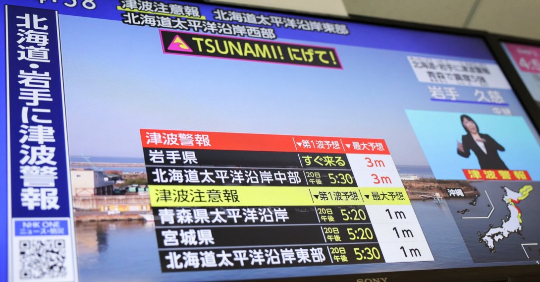 A television screen shows a news report on Japan Meteorological Agency's tsunami warning, in Tokyo, Japan, April 20, 2026. (Reuters Photo)