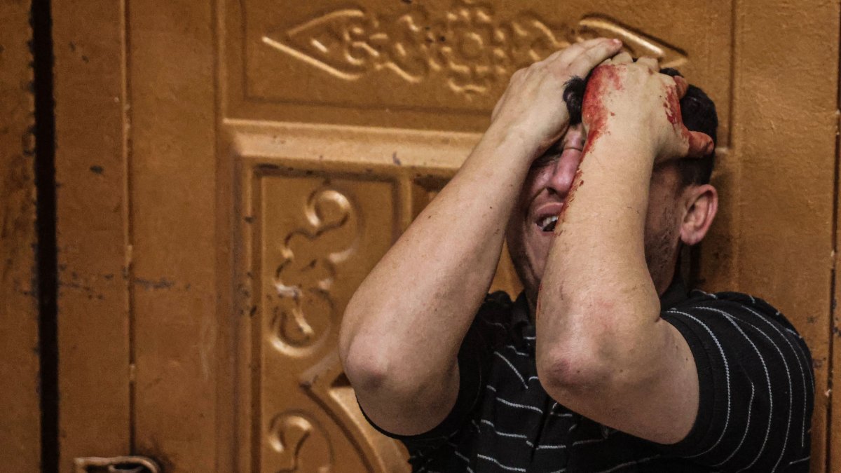 A Palestinian mourns a relative killed in an Israeli airstrike in Khan Yunis, southern Gaza Strip, Palestine, April 21, 2026. (AFP Photo)