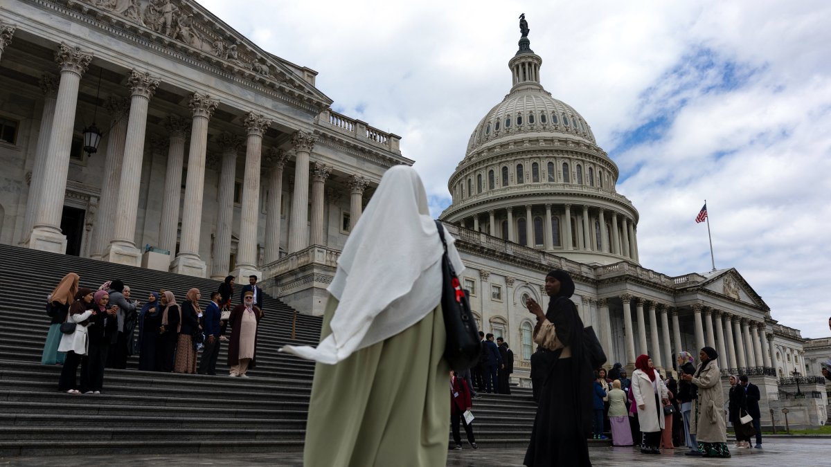 Members of the U.S. Council of Muslim Organizations (USCMO) gather to pose for a group photo on the steps of the House of Representatives at the U.S. Capitol as the group holds its 11th National Muslim Advocacy Day in Washington, D.C., April 20, 2026. (AFP Photo)