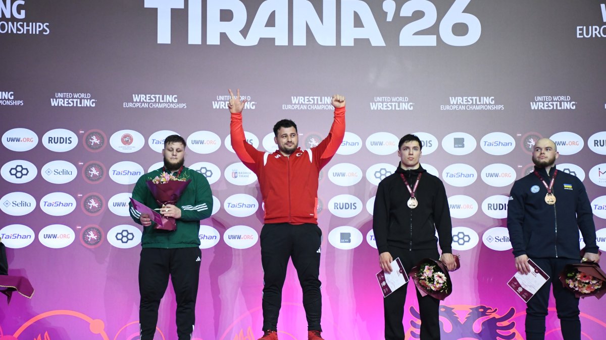 Rıza Kayaalp gestures after winning gold at the 2026 European Wrestling Championships in Tirana, Albania, April 22, 2026. (AA Photo)