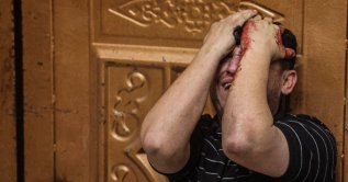 A Palestinian mourns a relative killed in an Israeli airstrike in Khan Yunis, southern Gaza Strip, Palestine, April 21, 2026. (AFP Photo)