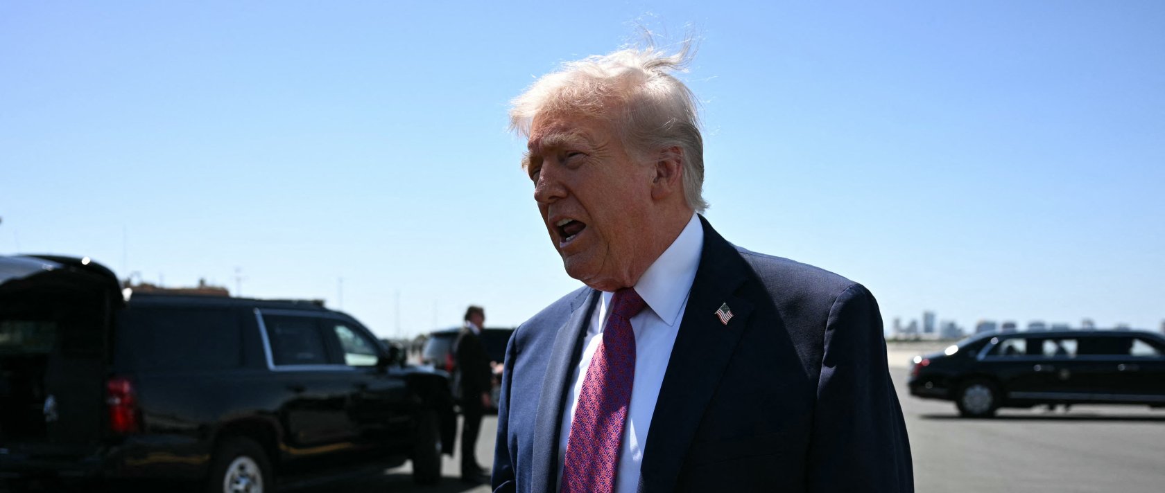 U.S. President Donald Trump speaks to reporters upon arrival at Phoenix Sky Harbor International Airport in Phoenix, Arizona, April 17, 2026. (AFP Photo)