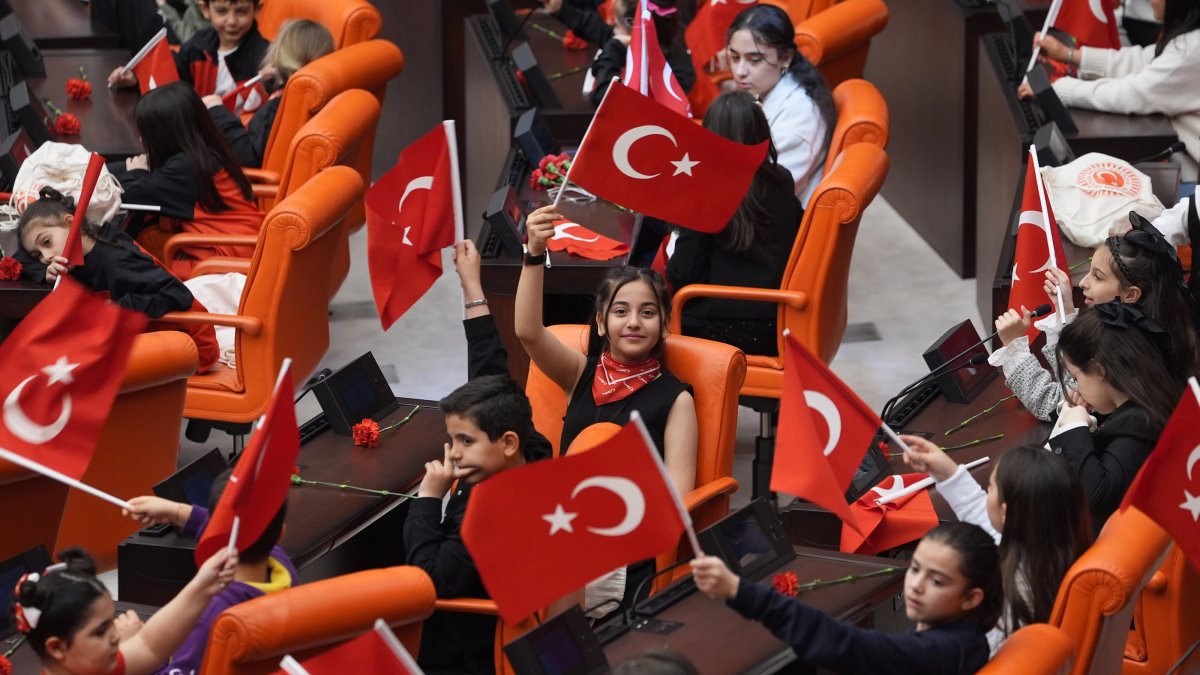 Children wave Turkish flags inside the Parliament building during National Sovereignty and Children’s Day celebrations, Ankara, Türkiye, April 21, 2026. (AA Photo)