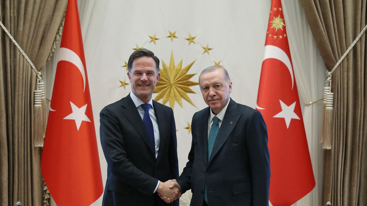 President Recep Tayyip Erdoğan shaking hands with NATO Secretary-General Mark Rutte at the Presidential Complex in Ankara. (AFP Photo via Presidency Handout)