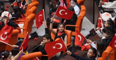 Children wave Turkish flags inside the Parliament building during National Sovereignty and Children’s Day celebrations, Ankara, Türkiye, April 21, 2026. (AA Photo)