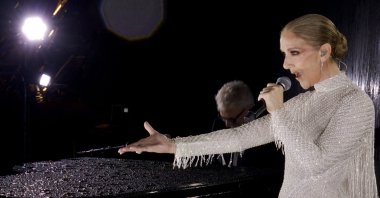 A grab of a video released by the Olympic Broadcasting Services shows Canadian Singer Celine Dion performing on the Eiffel Tower during the opening ceremony of the Paris 2024 Olympic Games, Paris, France, July 26, 2024. (AFP Photo)