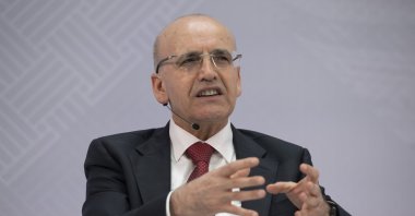 Treasury and Finance Minister Mehmet Şimşek speaks at a panel on the sidelines of the IMF-World Bank Spring Meetings, Washington, U.S., April 17, 2026. (AA Photo)