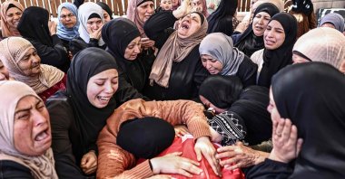 Relatives mourn the death of Jihad Marzouq Abu Naim during his funeral in Al-Mughayyir, east of Ramallah, in the Israeli-occupied West Bank, April 22, 2026. (AFP Photo)
