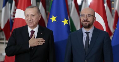 President Recep Tayyip Erdoğan is welcomed by European Council President Charles Michel prior to a meeting at the European Council building in Brussels, March 9, 2020. (AP Photo)