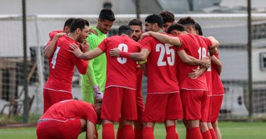 Iran's players gather on the pitch before a friendly football match between Iran and Costa Rica, in Antalya, southern Türkiye, March 31, 2026. (AFP File Photo)