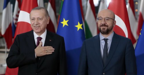 President Recep Tayyip Erdoğan is welcomed by European Council President Charles Michel prior to a meeting at the European Council building in Brussels, March 9, 2020. (AP Photo)