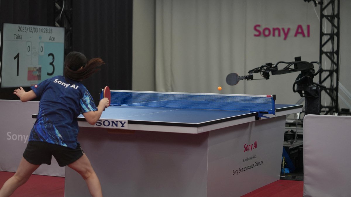 An unidentified female professional table tennis player competes against Sony AI autonomous robot "Ace" in December 2025 in Tokyo, Japan, as seen in this photograph released on April 22, 2026. (Reuters Photo)