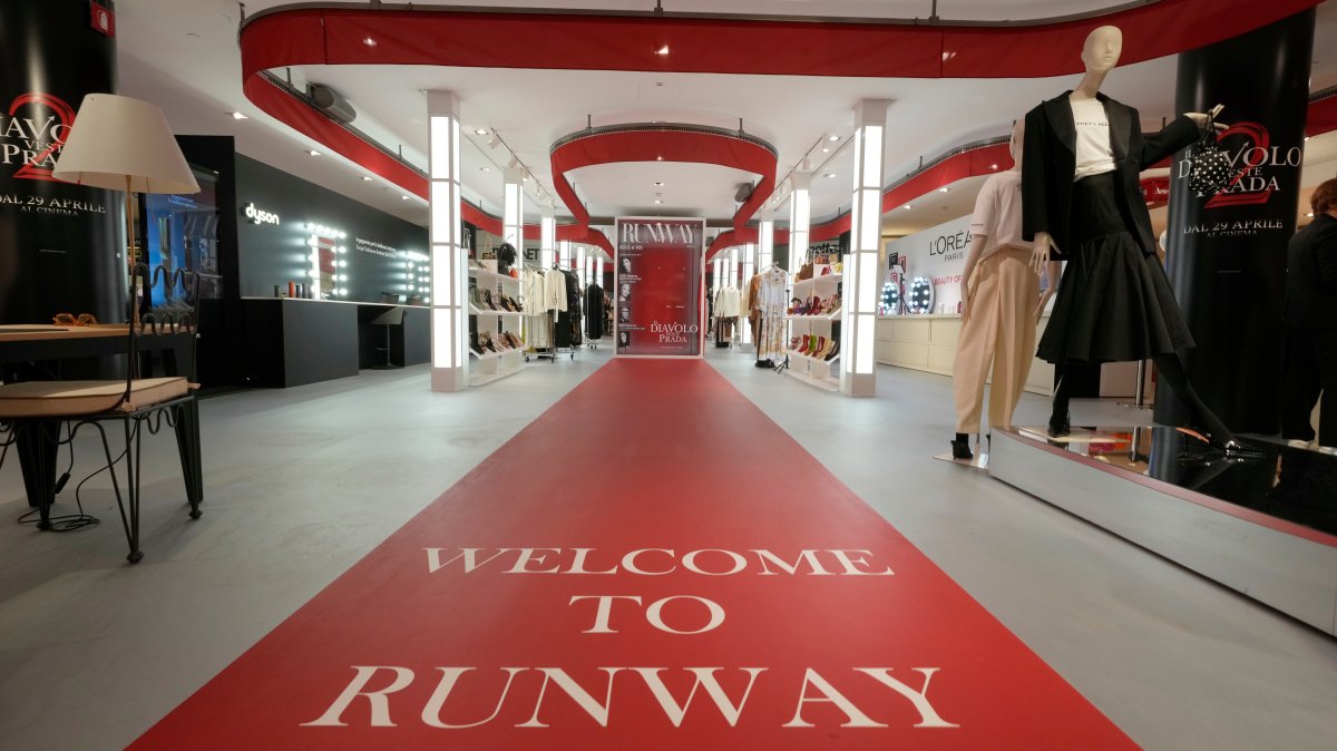 An installation of the new movie 'Devil Wears Prada 2' is displayed at La Rinascente shopping center, Milan, Italy, April 20, 2026. (AP Photo)