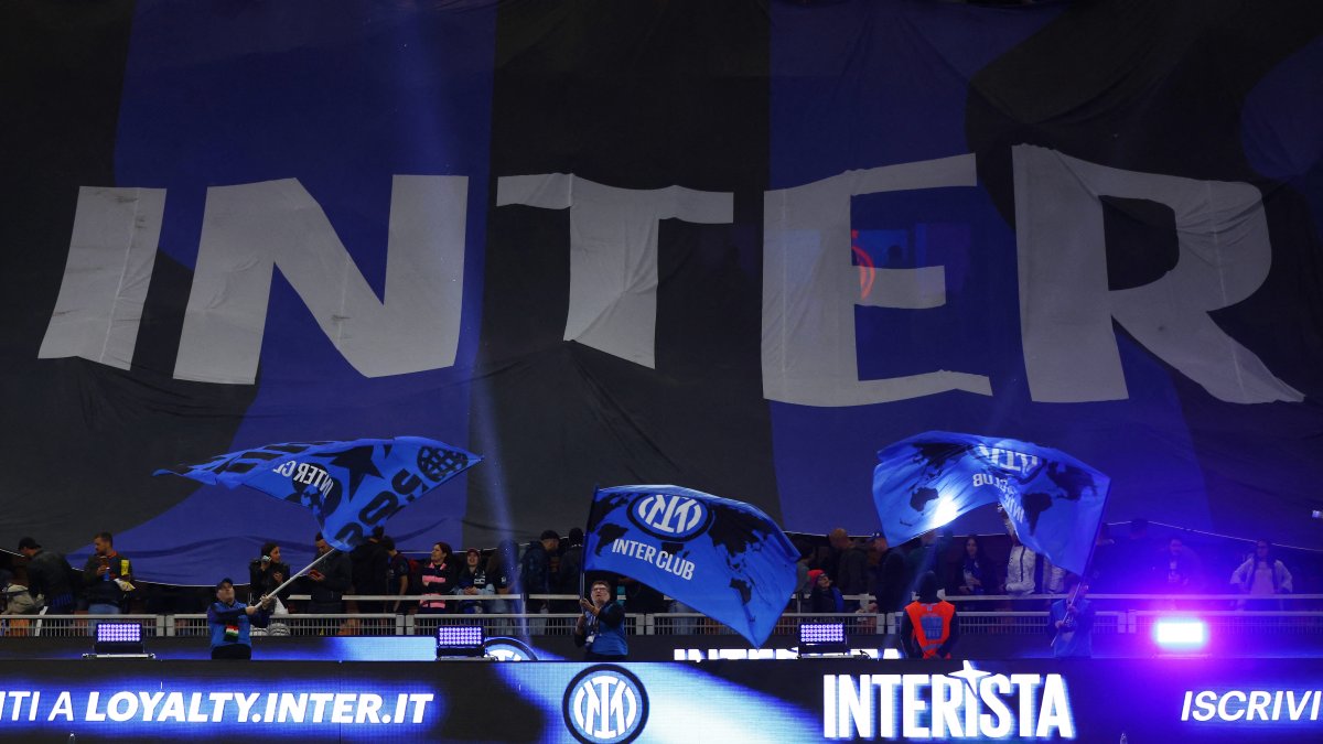 Inter Milan fans support their team with a giant banner inside the stadium before the match, Milan, Italy, April 21, 2026. (Reuters Photo)