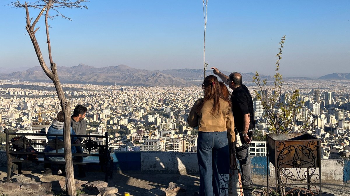 People visit a viewpoint overlooking the city at Pardisan Park, Tehran, Iran, April 22, 2026. (AFP Photo)