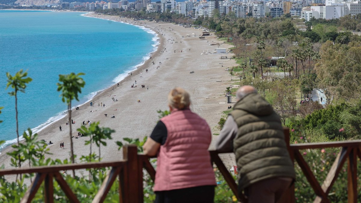 A couple looks down onto Konyaaltı beach, Antalya, southern Türkiye, March 30, 2026. (AFP Photo)