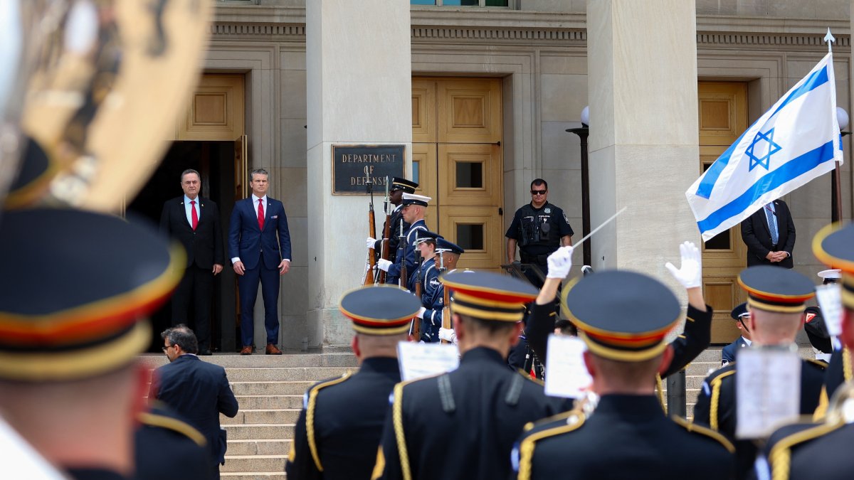 U.S. Secretary of Defense Pete Hegseth stands with Israel's Minister of Defense Israel Katz during an arrival ceremony for Katz at the Pentagon in Washington, D.C., July 18, 2025. (AFP Photo)