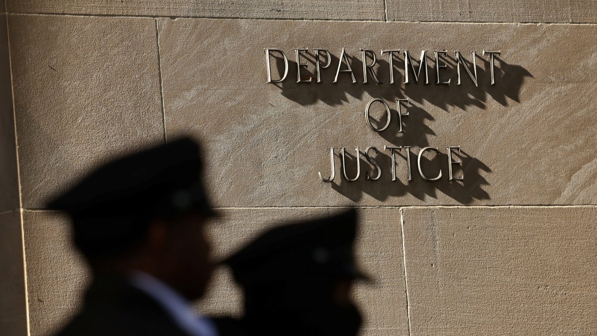 Police stand guard at the U.S. Department of Justice in Washington, D.C., April 6, 2026. (Reuters Photo)